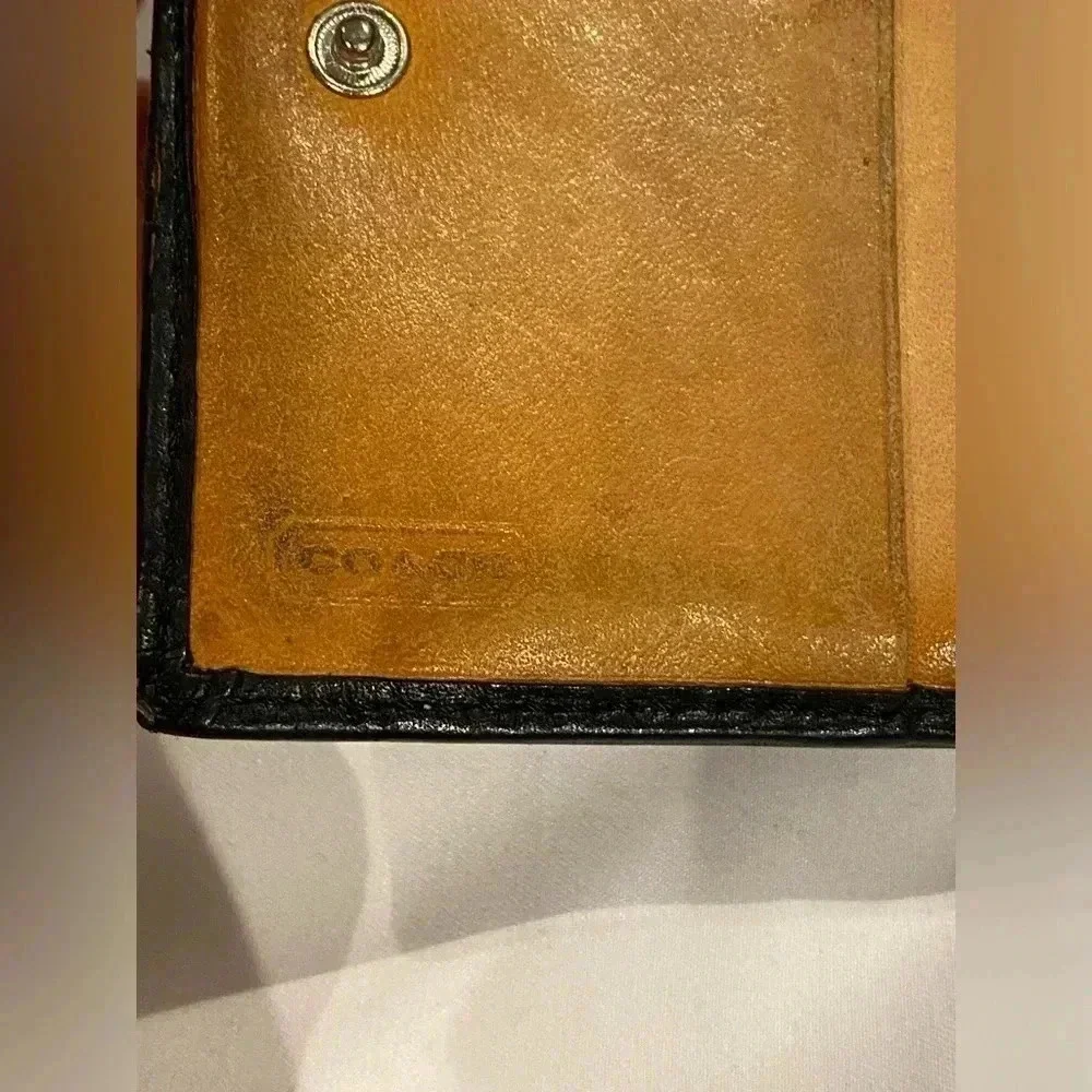 Coach signature bi-fold wallet